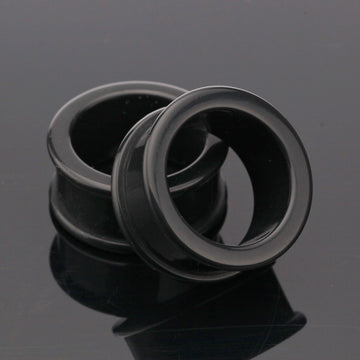 A Pair of Flexible Silicone Double Flared Ear Gauge Tunnel Plug